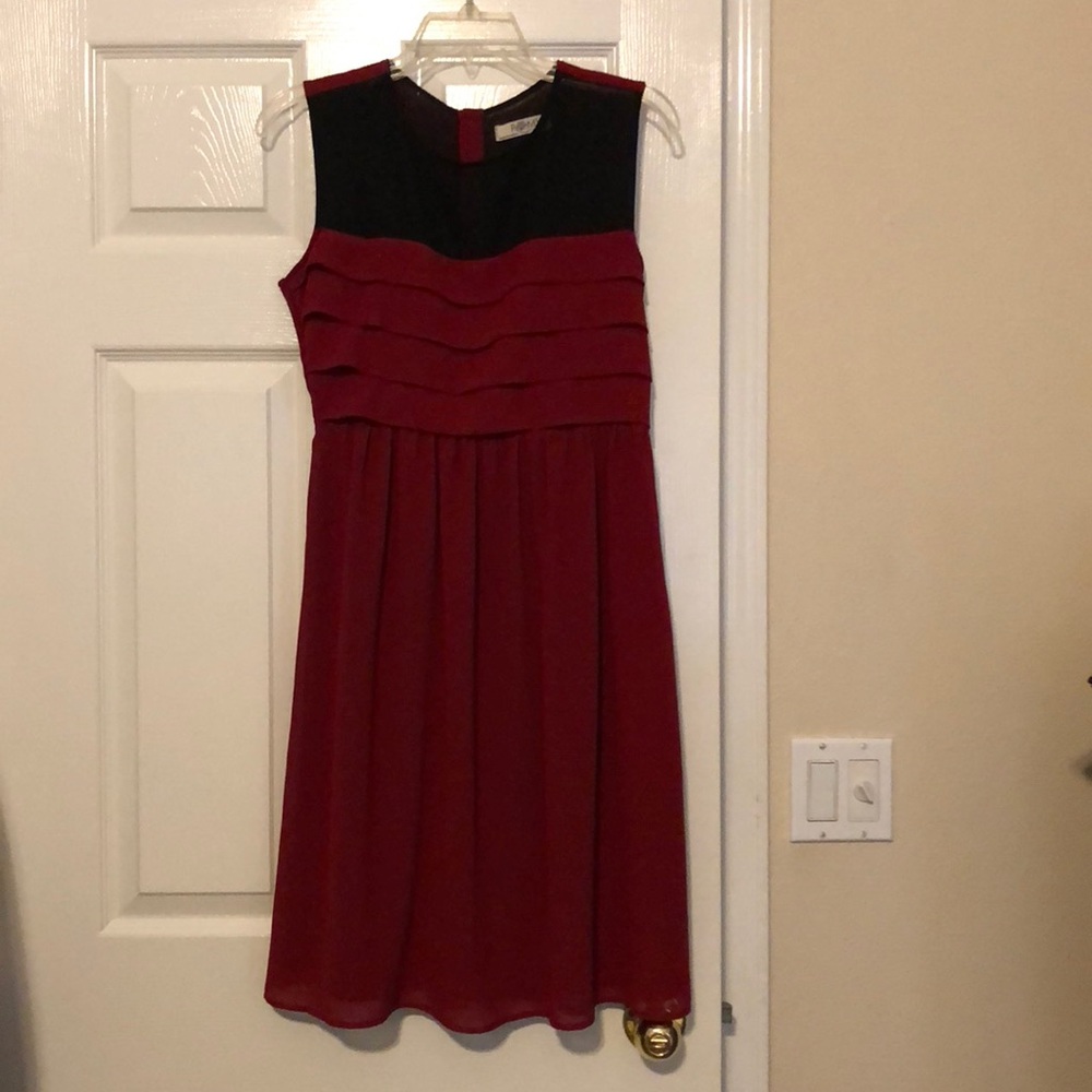 Romy size small black and cranberry dress.